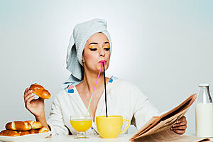 A woman eating breakfast