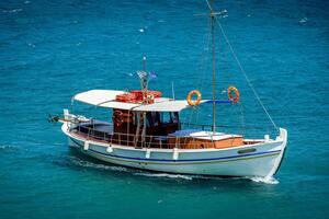 a white boat floating on top of a body of water, shutterstock, hurufiyya, pathos, vivid colors!, watch photo, fishing boat