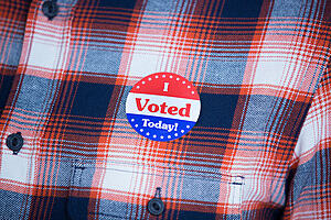 'I voted' badge on a shirt in close-up